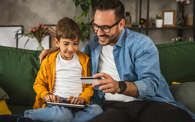 Father and son online shopping